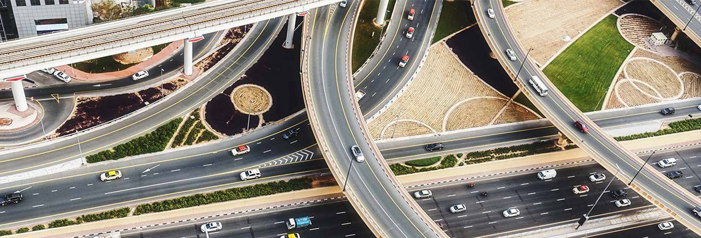 Aerial view of a big highway intersection in Dubai during the daytime.